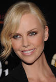 th_06915_celebrity_paradise.com_TheElderCharlizeTheron2011_06_08_CelebratesTheLaunchOfDIORVIIIinNY_14_122_1051lo.jpg